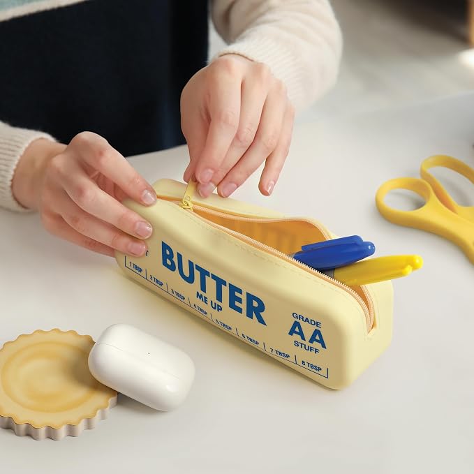 Genuine Fred BUTTER ME UP Silicone Pouch, Soft Flexible Material with Zipper Closure, For desk supplies, makeup, cords, travel essentials, 7.5 x 2 x 2.4 Inch